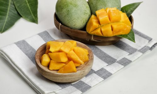 fresh-mango-juicy-chopped-mango-cubes-wooden-bowl-tropical-summer-concept-selective-focus fresh-mango-juicy-chopped-mango-cubes-wooden-bowl-tropical-summer-concept-selective-focus